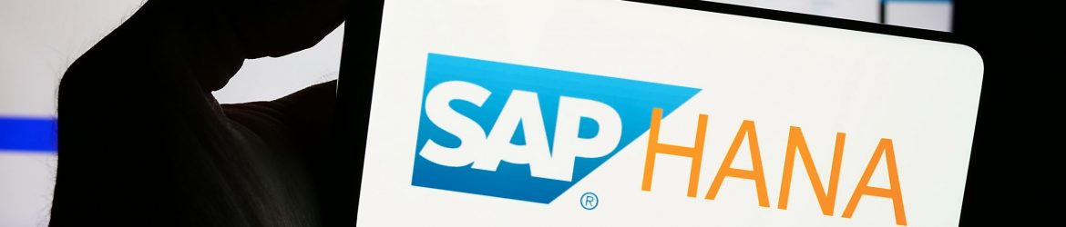 Stuttgart, Germany - 11-08-2023: Person holding mobile phone with logo of database management software SAP HANA in front of business web page. Focus on phone display.